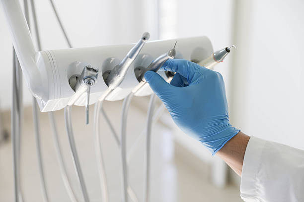 Professional Tooth Extraction technician working in Lynchburg, OH